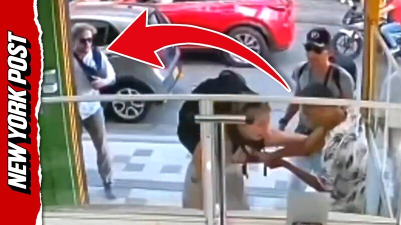 刃物を持った武装強盗に襲われた女性を救うヘルメット男そして一緒に居た男性は壁に隠れるｗｗｗ